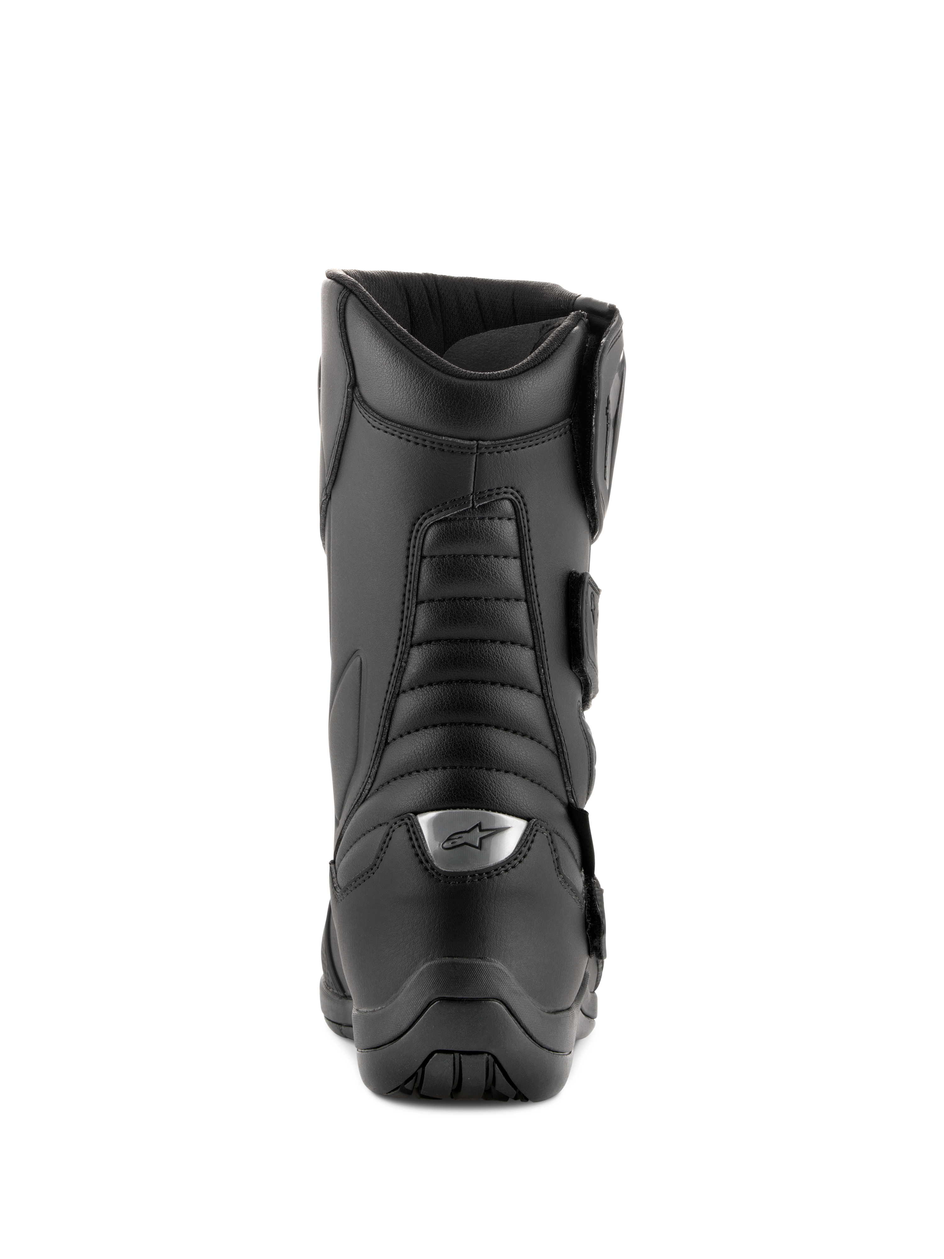 Alpinestars Radon Drystar® Boots, czarne, turystyczne buty motocyklowe, widok z tyłu z harmonijkowymi strefami elastycznymi i srebrnym logo na pięcie, wytrzymała konstrukcja z mikrowłókien