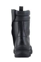 Buty damskie Alpinestars Ava, czarne, widok z tyłu przedstawiający podwyższoną, masywną gumową podeszwę i boczny zamek po wewnętrznej stronie, konstrukcja ze skóry licowej z wyściełanym kołnierzem kostki i wytłoczonym logo, nowoczesne miejskie obuwie motocyklowe.