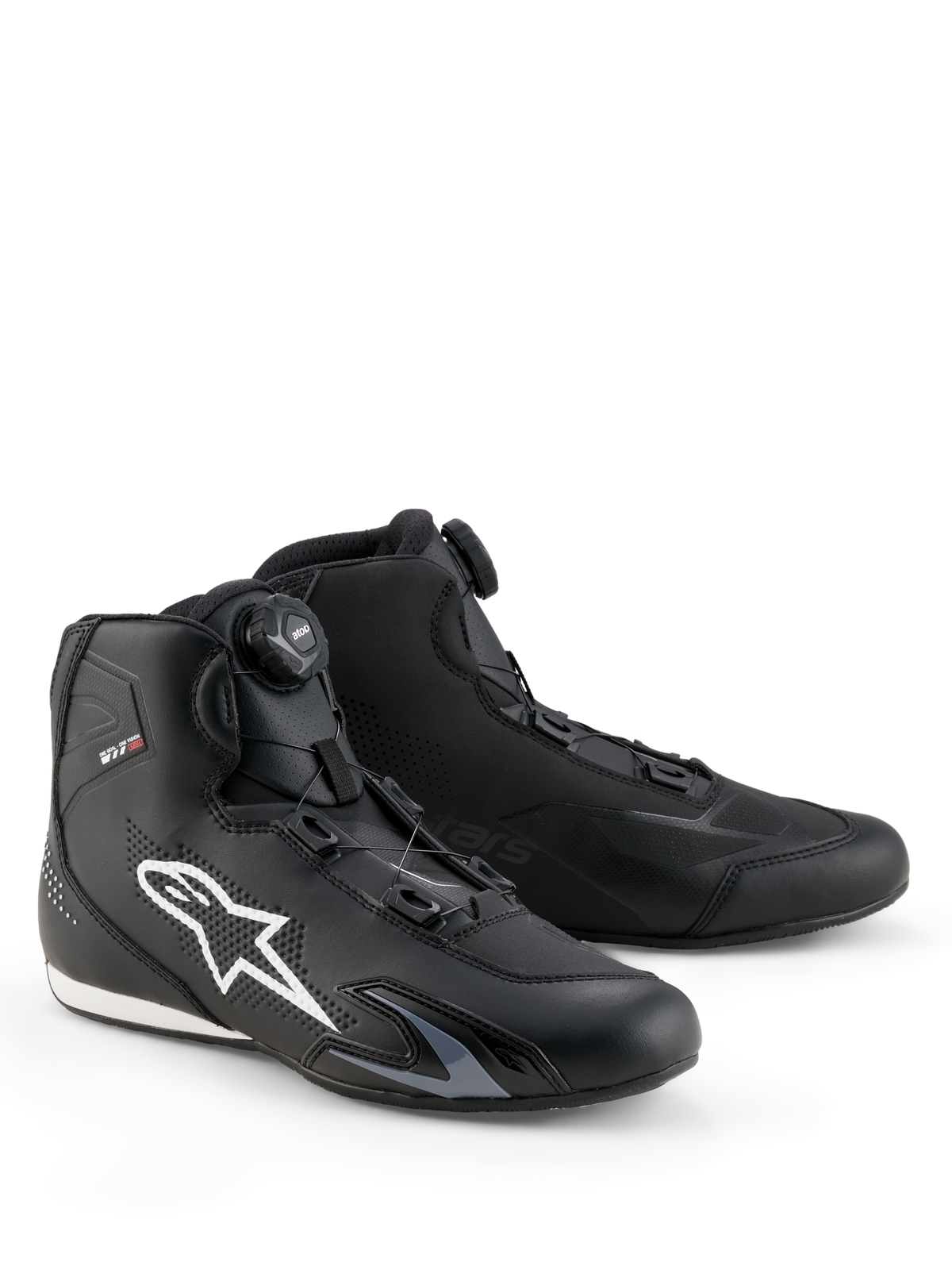 Buty Alpinestars Celer, buty motocyklowe, czarno-białe, wyposażone w pokrętło systemu zamykania Rotor, duże białe logo Astar z boku, smukła konstrukcja z technicznej mikrofibry do sportowej jazdy ulicznej