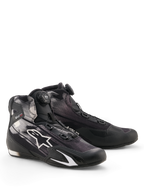 Buty Alpinestars Celer Superair, buty motocyklowe, czarno-białe, z systemem zamykania Rotor obsługiwanym pokrętłem na języku, białym logo gwiazdy na oddychającej tekstylnej cholewce i sportowym, niskoprofilowym designem.