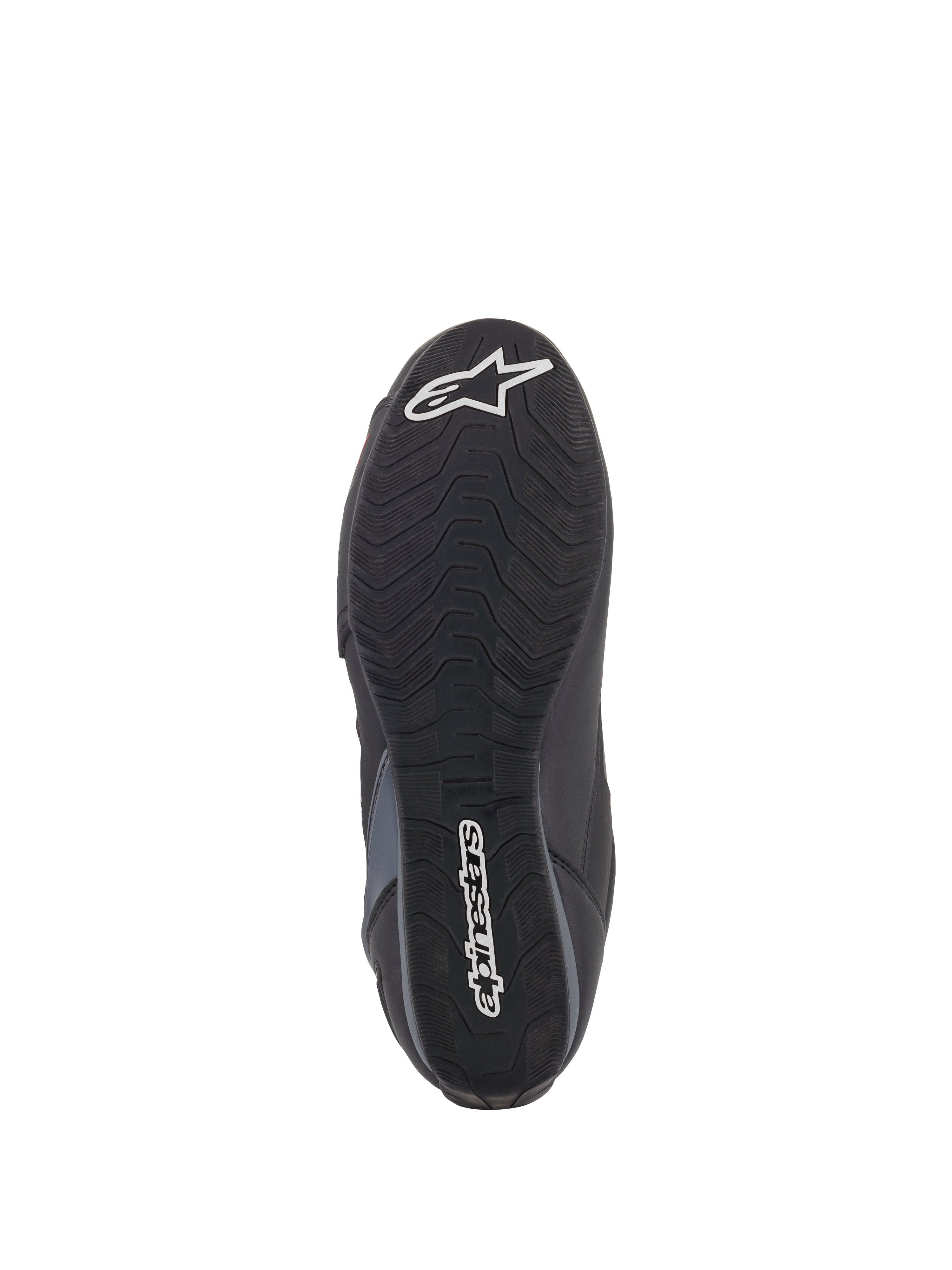 Buty Alpinestars Faster-3 Rideknit®, widok podeszwy, czarna gumowa podeszwa zewnętrzna z falistym wzorem bieżnika, z białym napisem Alpinestars i logo gwiazdy, pokazujące detale przyczepności do jazdy motocyklowej