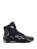 Alpinestars Stella Faster-4, damskie buty motocyklowe, czarno-białe, wysoka konstrukcja z logo Astars i paskiem na kostce, widok z boku