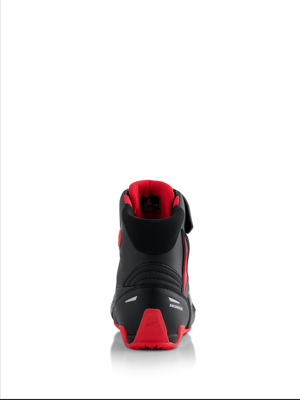 Alpinestars Honda Faster-4 Shoes, buty motocyklowe, czarno-czerwone, widok z tyłu ukazujący białe logo Honda i czerwony ochraniacz pięty TPU, wyściełany kołnierz z czerwoną podszewką z siatki, odblaskowe akcenty dla bezpieczeństwa