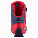Alpinestars Austin Riding Shoe, granatowy i jaskrawoczerwony, widok z tyłu pokazujący wzmocniony ochraniacz pięty z TPU, czerwoną wyściółkę z siateczki i teksturowaną gumową podeszwę, sportowe obuwie motocyklowe