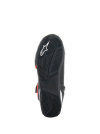 Buty Alpinestars Superfaster, widok podeszwy, czarna gumowa podeszwa zewnętrzna z zaawansowanym wzorem bieżnika, białe logo Astars i wytłoczony napis Alpinestars, zaprojektowane dla komfortu podczas jazdy motocyklem i chodzenia