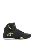 Buty Alpinestars Sektor, buty motocyklowe, czarno-żółte fluorescencyjne, widok z boku ukazujący żółte logo gwiazdy, pasek na kostkę z brandingiem oraz biały akcent na pięcie na smukłej cholewce z mikrofibry