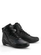 Buty Alpinestars Stella Faster-4 Drystar®, damskie wodoodporne buty motocyklowe, czarno-srebrne, cholewka z mikrofibry ze sznurowaniem i paskiem na kostkę, ochronne wzmocnienia TPU i branding Alpinestars.