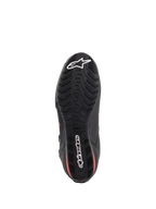Buty Alpinestars Faster-3 Drystar®, buty motocyklowe, czarne i czerwone fluo, widok podeszwy od spodu, teksturowana gumowa podeszwa zewnętrzna z falistym wzorem bieżnika, białe logo gwiazdy i logotyp Alpinestars, wodoodporne obuwie wyczynowe