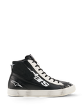 Alpinestars Stated Flair Shoes, miejskie buty motocyklowe, czarno-białe, skórzana konstrukcja za kostkę z dużym białym logo z boku, biały perforowany panel z oczkami, boczny zamek błyskawiczny oraz biała gumowa podeszwa z patyną vintage