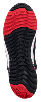 Alpinestars MM93 CR-X Drystar® Riding Shoes, Outsole View, Black and Red, featuring an asymmetric stud configuration for grip, oil-resistant rubber compound, and Alpinestars branding on the heel.