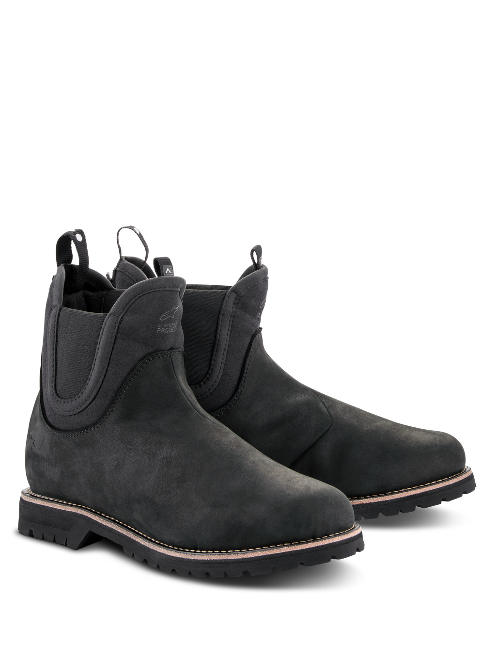 Alpinestars Turnstone Shoes, czarne buty motocyklowe w stylu Chelsea, cholewka z matowej skóry bydlęcej z elastycznymi panelami bocznymi i pętelkami z tyłu, obuwie do jazdy miejskiej z wytrzymałą podeszwą z protektorem i białymi przeszyciami na otoku
