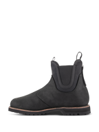 Alpinestars Turnstone Shoes, czarne buty motocyklowe w stylu Chelsea, widok z boku, wykonane z 1,5 mm skóry bydlęcej z elastycznymi panelami na kostkach oraz przednim i tylnym uchwytem