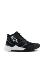 Alpinestars Speedflight Shoes, high-top motorcycle riding shoes, Black and White, featuring a ripstop upper with seamless reinforcements, white star logo on the side, dual-density sole with thick white midsole and black accents, modern sneaker-inspired design for urban motorcycling