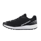 Buty Alpinestars Meta Road V2, buty sportowe, czarno-białe, oddychająca cholewka z siatki z ukośnymi prążkami, gruba biała podeszwa środkowa, białe logo Alpinestars z boku, białe paski na pięcie, sportowy design do użytku codziennego i jako odzież robocza dla zespołów wyścigowych