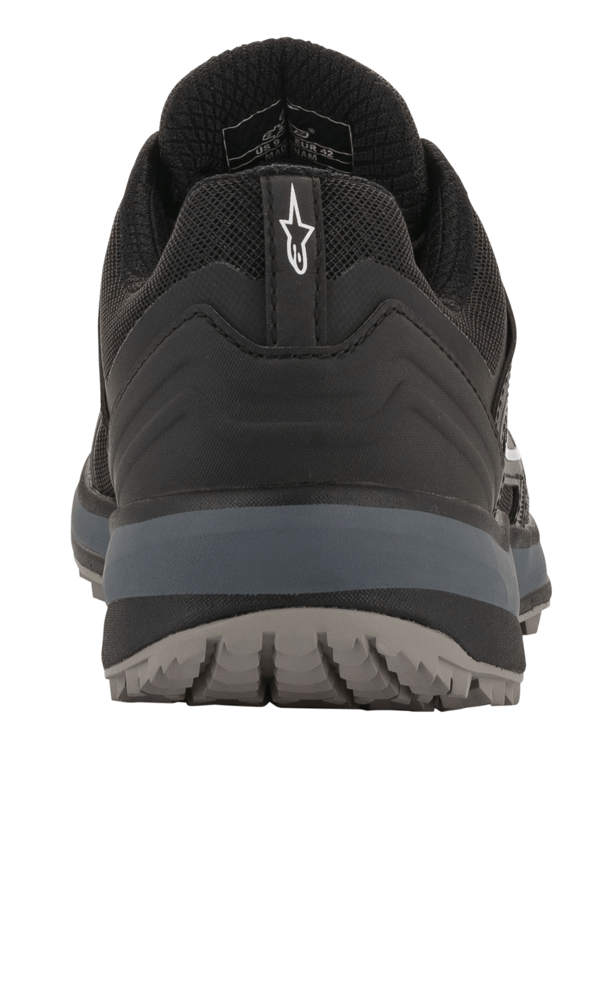 Buty Alpinestars Meta Trail, wyczynowe buty do biegania, czarne i ciemnoszare, widok z tyłu przedstawiający uchwyt na pięcie z białym logo Astar, ciemnoszarą podeszwę środkową i teksturowaną podeszwę zewnętrzną, codzienne obuwie inspirowane sportami motorowymi do padoku