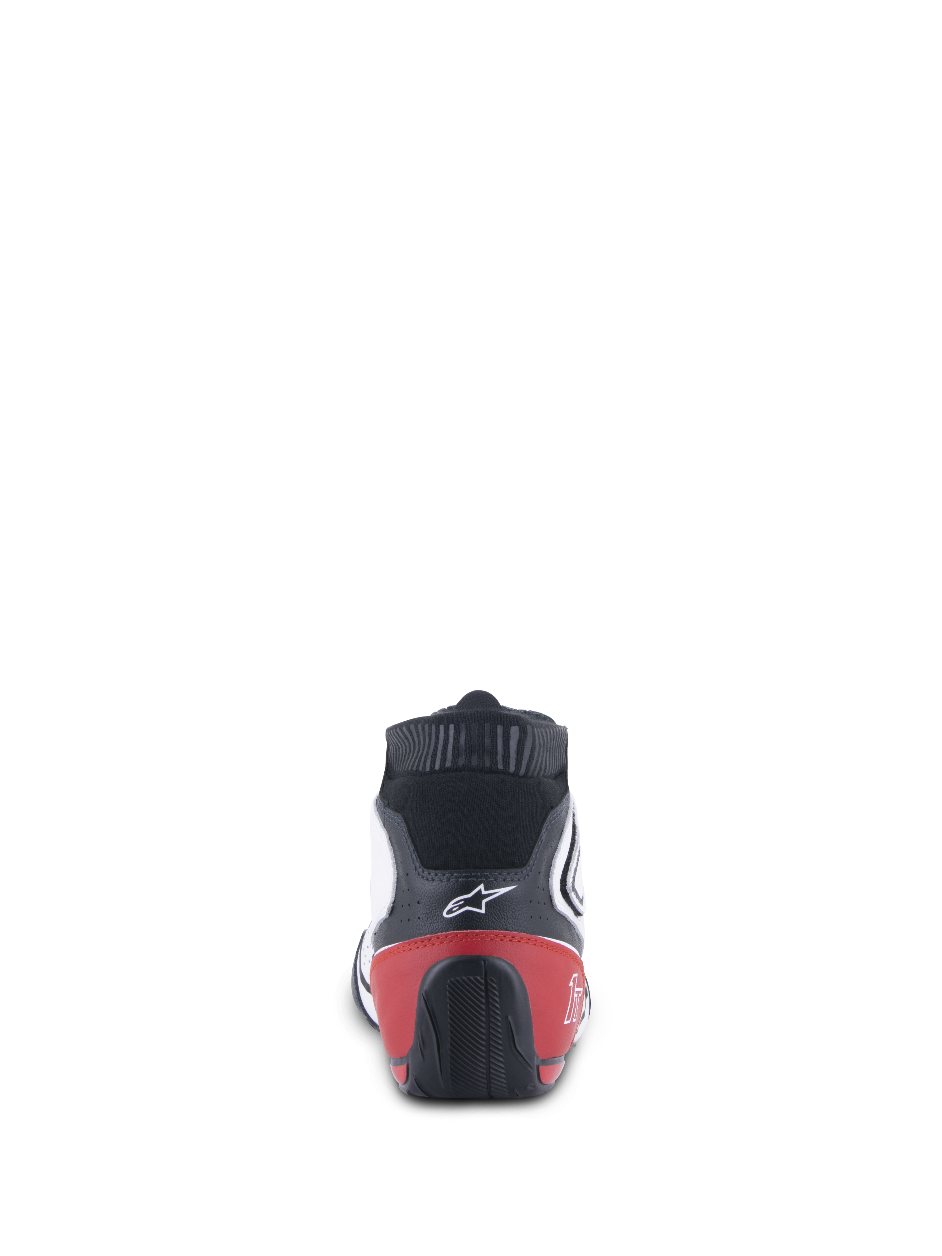 Buty Alpinestars Tech-1 T V3 FIA, buty wyścigowe, biało-czarno-czerwone, widok z tyłu przedstawiający czerwony zapiętek i czarną teksturowaną podeszwę zewnętrzną, białe logo Alpinestars na czarnej skórzanej cholewce