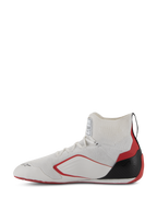 Buty Alpinestars Supertech - FIA/SFI, buty wyścigowe, biało-czerwono-czarne, widok z boku ukazujący dzianinową konstrukcję cholewki, czerwone boczne akcenty i czarną osłonę pięty z włókna węglowego