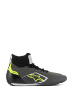 Alpinestars Supertech Shoes FIA/SFI, professional high-top racing shoes, Cool Gray and Black with Yellow Fluo accents, featuring a knitted aramid upper, carbon fiber heel cup, yellow star logo, and white and black thin sole, motorsport certified footwear