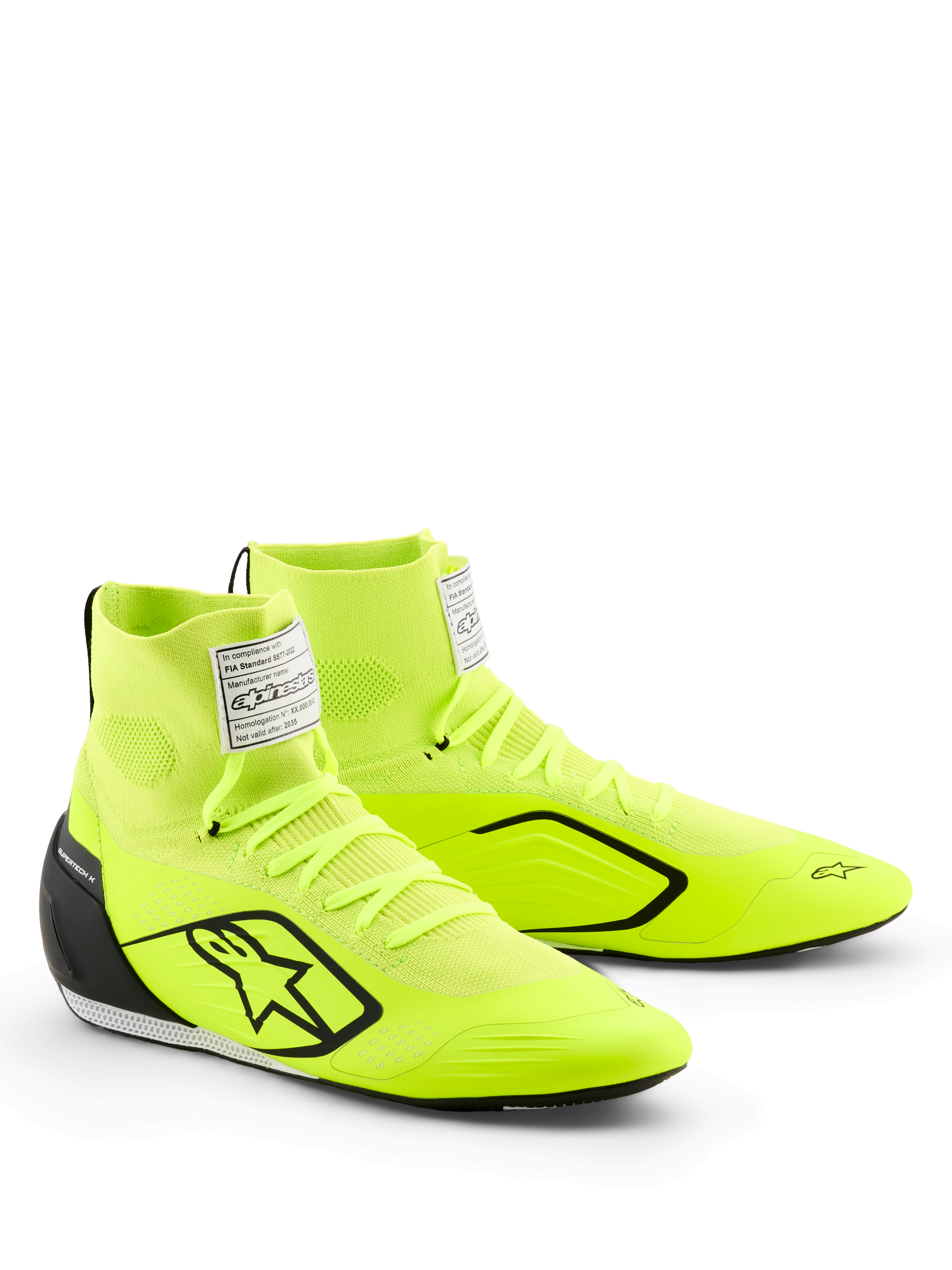 Buty Alpinestars Supertech K, buty kartingowe, żółty fluo, czarny i biały, z jaskrawożółtą neonową dzianinową cholewką z czarnym logo gwiazdy, wtryskiwanym zapiętkiem z TPU, białą etykietą FIA na języku i smukłym designem motorsportowym