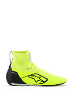 Alpinestars Supertech K Shoes - FIA, buty kartingowe, żółte fluo i czarne, widok z boku, w pełni dzianinowa cholewka z wysokim kołnierzem wokół kostki, czarny zapiętek TPU, duże czarne logo Alpinestars, lekkie obuwie wyścigowe