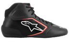 Buty Alpinestars Tech-1 K Start V2, buty kartingowe, kolor Asphalt Black i Orange Fluo, profil boczny z cholewką z mikrofibry z laserowymi perforacjami, białe logo Alpinestars z pomarańczową obwódką oraz czarne sznurowadła