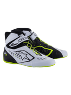 Alpinestars Tech-1 KX V3 Shoes - FIA, buty kartingowe, czarne, białe i żółte fluo, wyczynowe obuwie wyścigowe z asymetrycznym sznurowaniem, paskiem na rzep na kostce, neonowo żółtymi akcentami na sznurowadłach i podeszwie oraz oddychającymi panelami wycinanymi laserowo