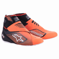 Alpinestars Tech-1 KZ V2, buty kartingowe, czarno-pomarańczowe fluo, wysoka konstrukcja z dzianinową cholewką i białym logo Astars, czarne panele z siatki, teksturowane nakładki, cienkie białe podeszwy, podwójne zapięcia na rzepy, aerodynamiczne obuwie wyczynowe