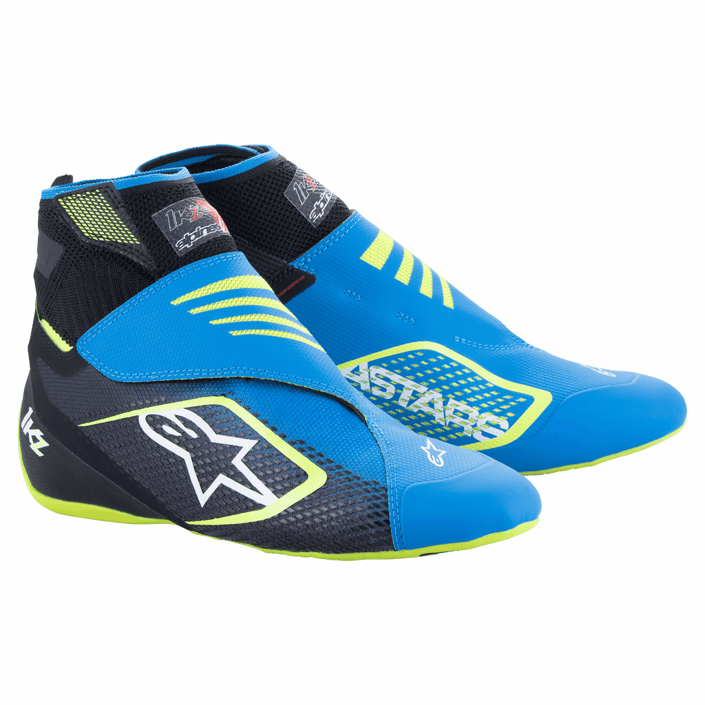 Buty kartingowe Alpinestars Tech-1 KZ V2, niebiesko-czarne i żółte fluo, z bezszwową dzianą cholewką, podwójnym zapięciem na rzep na kostce, dużym białym logo gwiazdy z boku, smukła lekka konstrukcja do sportów motorowych