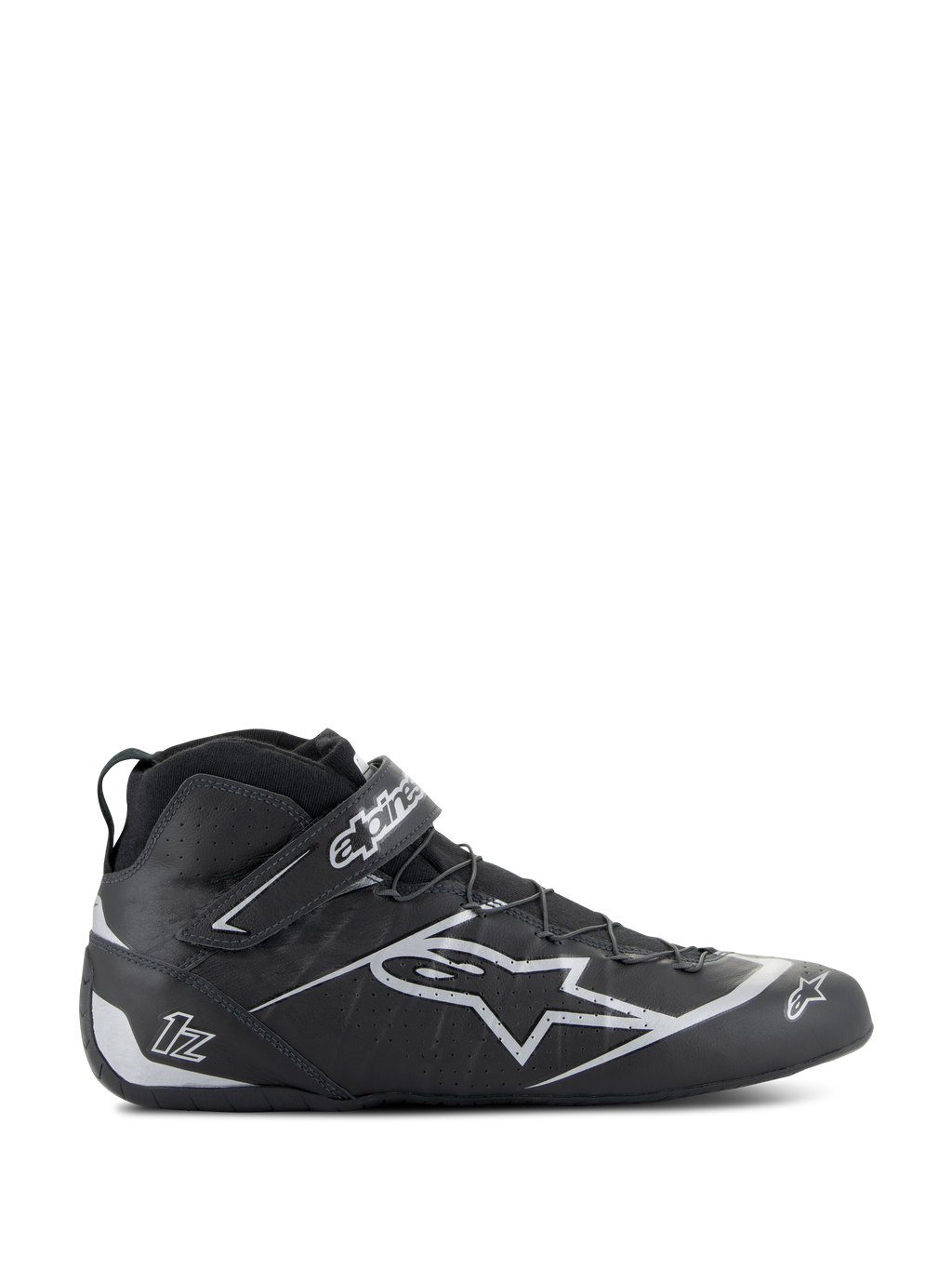 Alpinestars Tech-1 Z V3 Shoes FIA, czarno-srebrne buty wyścigowe, profil boczny o wysokim kroju ze srebrnym logo gwiazdy, zintegrowane zapięcie na rzep, system szybkiego sznurowania, perforowane panele skórzane dla oddychalności, profesjonalne obuwie motorsportowe z certyfikatem FIA