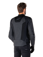 Alpinestars Missile V3 Airflow Leather Jacket, Black, Rear view on model, featuring perforated leather and mesh panels for ventilation, external TPU protectors on shoulders and elbows, sleek racing-inspired design