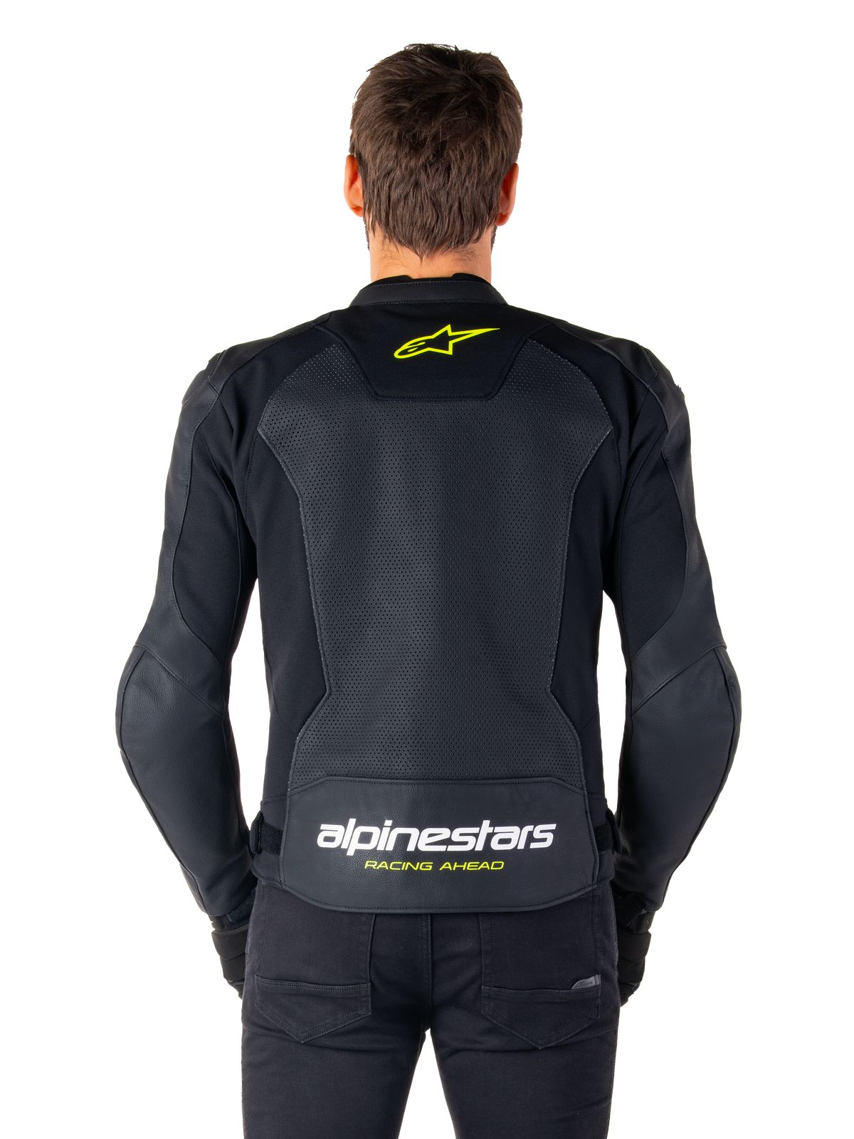 Kurtka skórzana Alpinestars Faster V3 Airflow, sportowa kurtka motocyklowa, czarna z żółtymi akcentami fluo, widok z tyłu prezentujący duże panele z perforowanej skóry, żółte logo gwiazdy w górnej części pleców oraz wyraźne oznaczenie marki na dole.