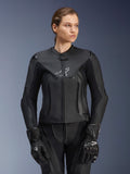 Alpinestars Stella GP Plus V4 Leather Jacket, Black, Women's Motorcycle Racing Jacket, premium leather construction with protective padding, sleek design with subtle logo, worn by a female model with matching black gear