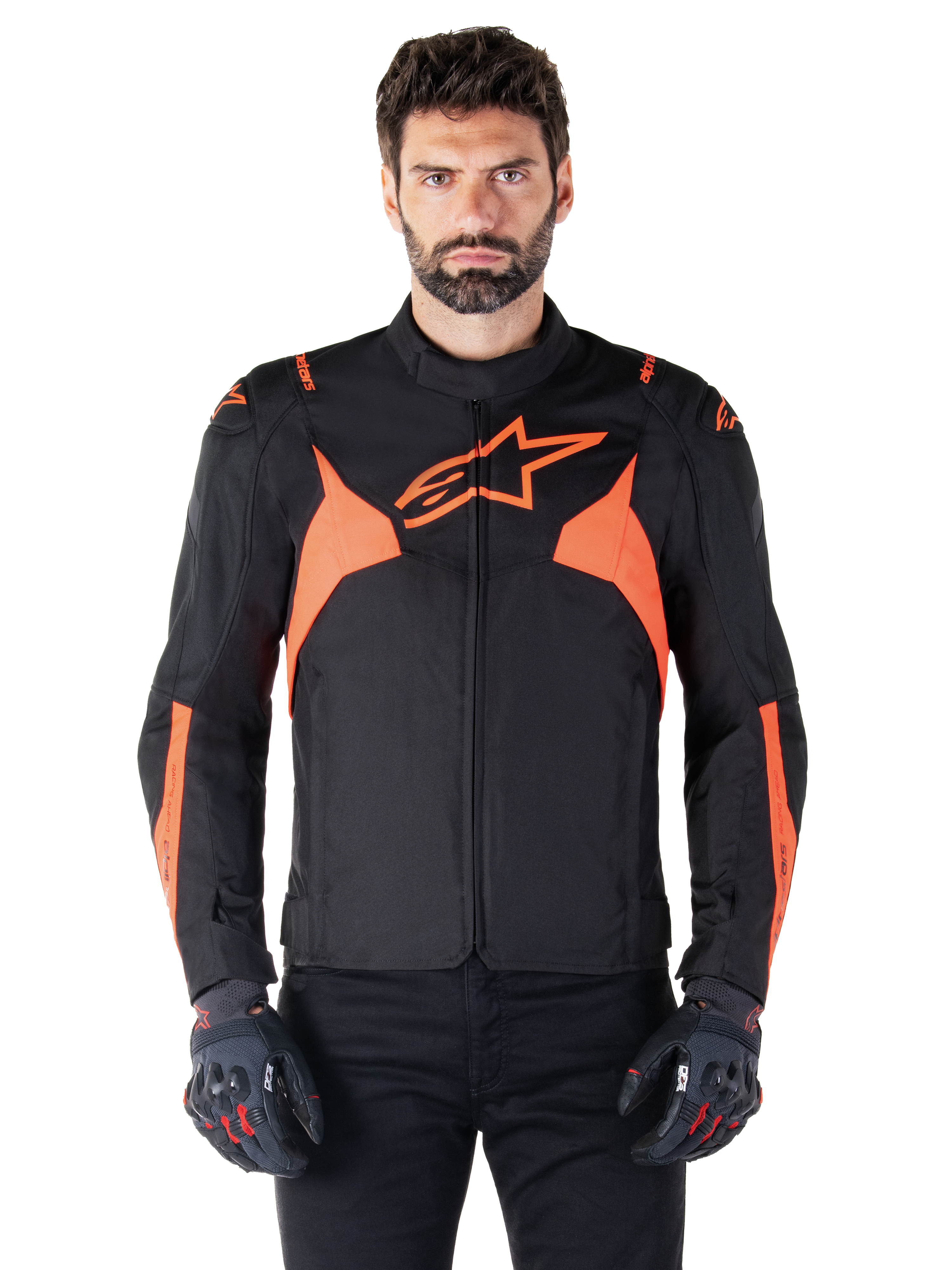 Alpinestars T-Jaws V4 Waterproof Jacket, Motorcycle Sport Jacket, Black and Red Fluo, featuring neon accents and a prominent star logo on the chest, worn by a male model with black riding gloves, sleek racing-inspired textile design