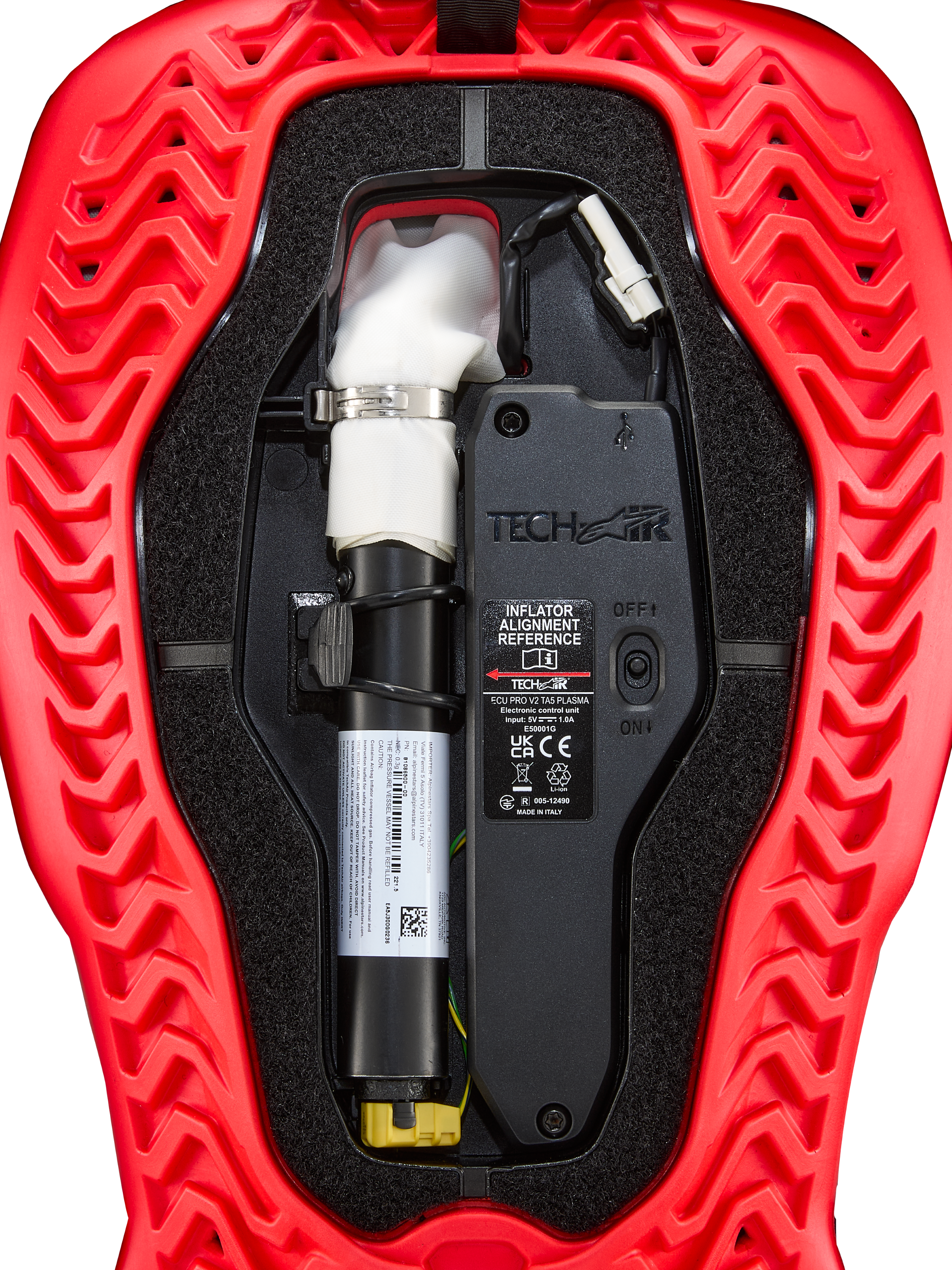 Alpinestars Tech-Air® 5 Plasma airbag replacement canister, black ECU, and white inflator in a red ribbed shell.