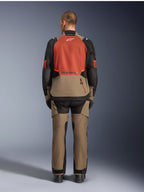 Alpinestars Andes V4 Drystar® Jacket, Walnut Rust Black, rear view of motorcycle touring jacket featuring rust-colored upper back panel and walnut lower section, worn with matching adventure pants and black boots