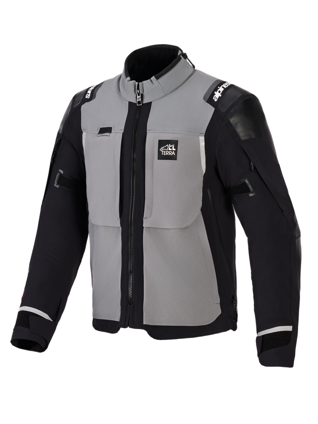 Alpinestars Andes Pro Drystar® XF Jacket, Adventure Motorcycle Jacket, Dark Gray and Black, featuring gray chest panels with black sleeves and sides, 'ALL TERRA' branding on the chest, Alpinestars logo on the shoulders, technical textile construction with ventilation zippers and adjustable cuffs.