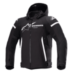 Alpinestars Zaca Waterproof Jacket, Black motorcycle jacket with detachable hood, large white Alpinestars logo on chest, white stripes on upper arms and vertical side accents, front zipper, reinforced shoulder padding, adjustable straps on waist and arms, textile softshell construction