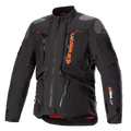 Alpinestars AMT-10R Drystar XF Jacket, motocyklowa kurtka turystyczna adventure, czarna z pomarańczowymi akcentami, szare wzmocnienia na ramionach, liczne zamki z pomarańczowymi uchwytami, regulowane paski, czerwona podszewka, techniczna odzież ochronna