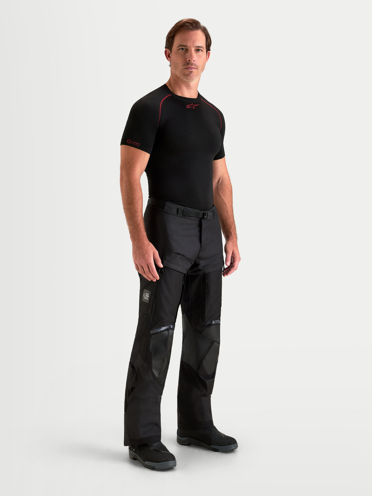 Alpinestars Harok V2 Drystar Pants, Men's adventure motorcycle pants in black, featuring durable ripstop construction and thigh ventilation, worn by a male model.