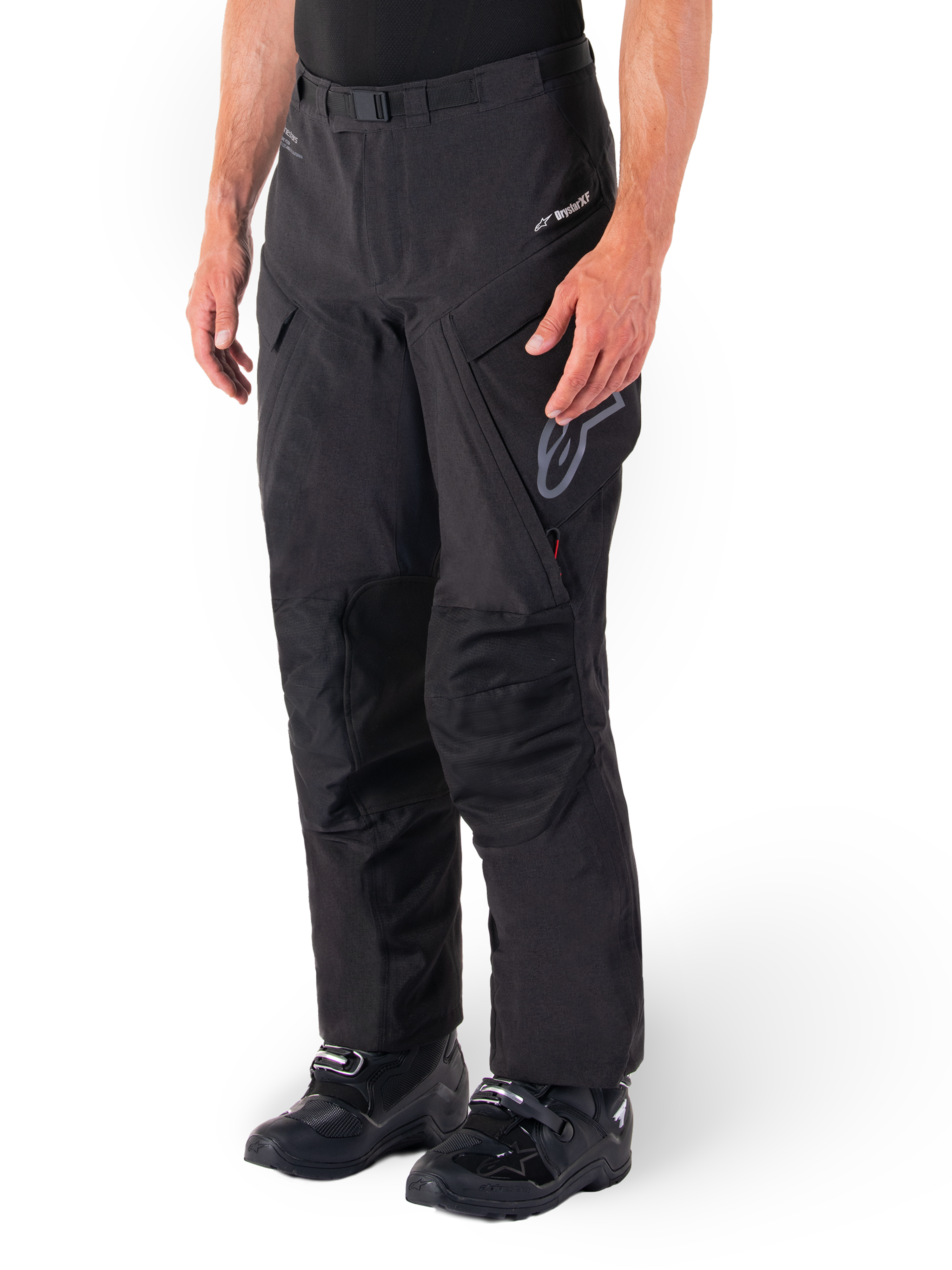 Alpinestars Hyde XT Drystar® Pants, Adventure Touring Motorcycle Pants, Black, worn with black boots, featuring laminated Drystar®XF membrane branding, reinforced knee panels, and zippered cargo pockets.