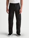 Alpinestars C-1 Waterproof spodnie motocyklowe męskie urban contemporary, czarne, widok z przodu na model w białym t-shircie, z trwałą powłoką poliestrową i prostym krojem