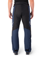 Alpinestars St-1 Waterproof Pants, motocyklowe spodnie turystyczne, ciemnoniebieskie i czarne z jaskrawoczerwonymi akcentami, widok z tyłu, opływowy krój turystyczny, wytrzymała konstrukcja tekstylna, odblaskowe logo, regulowane zapięcia na kostkach.