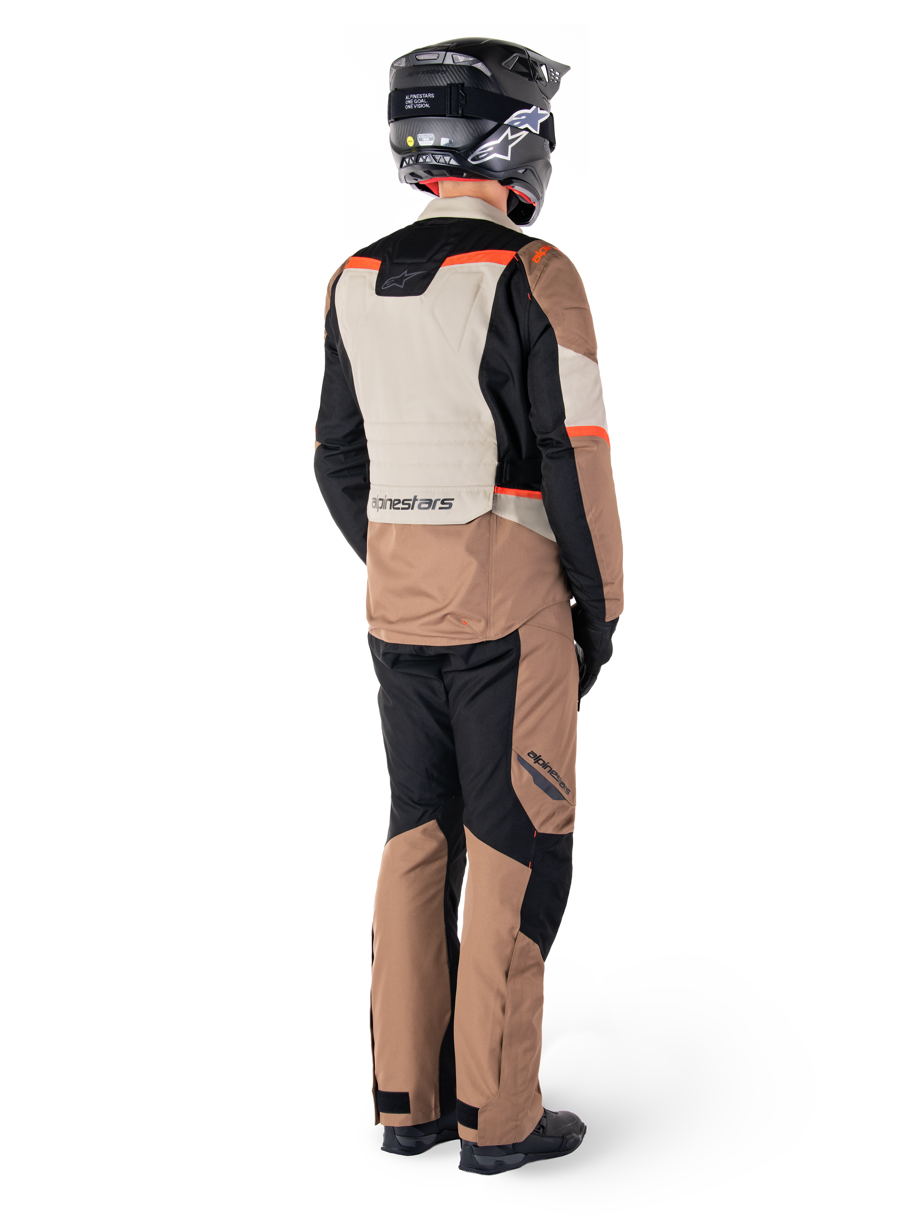 Alpinestars ST-1 Waterproof Pants, Dark Khaki Sand Black Red Fluo, adventure touring motorcycle gear seen from the back, worn with matching jacket, black helmet, and boots, durable textile construction with red accents