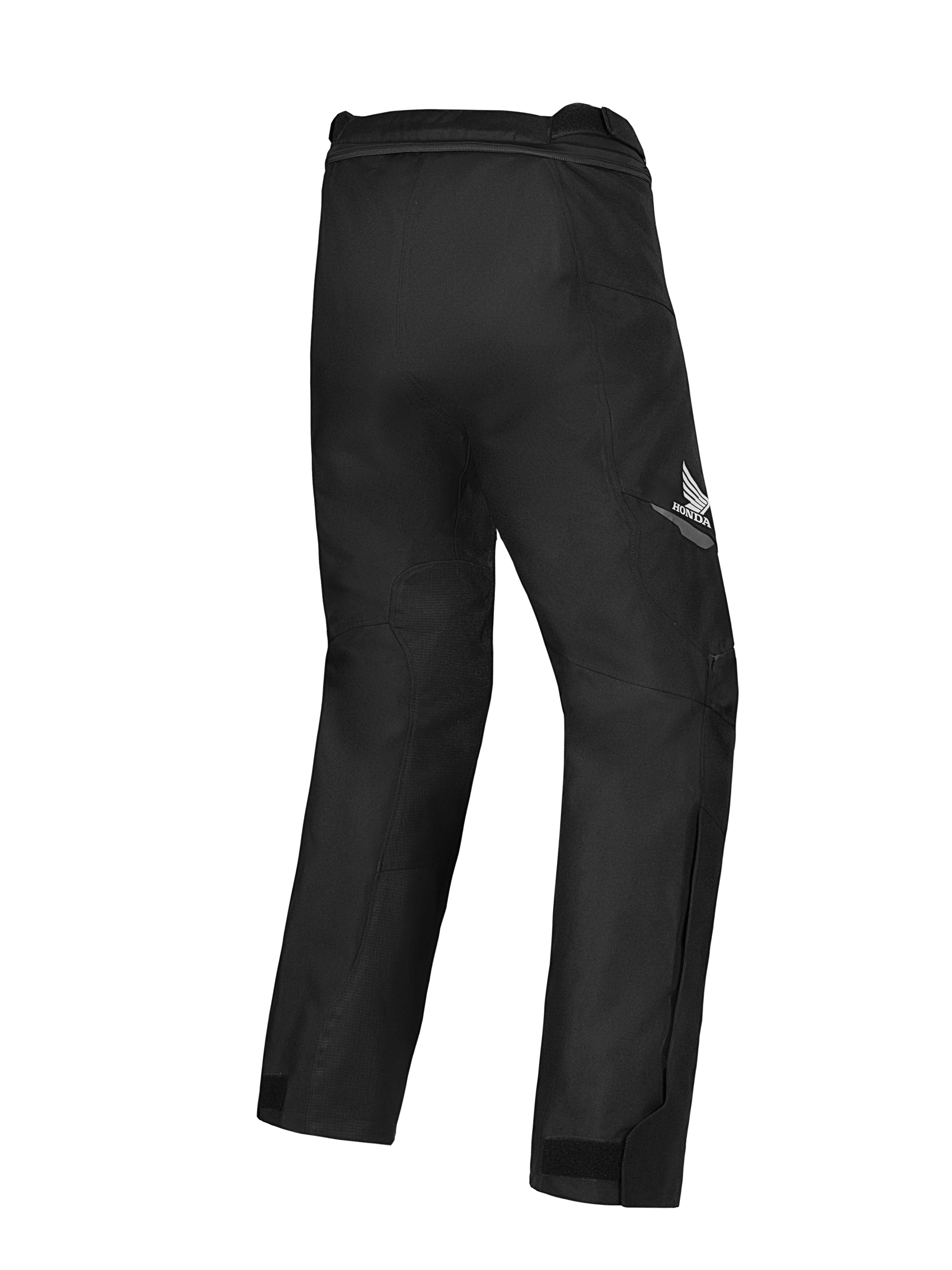 Spodnie Alpinestars Honda ST-1 Waterproof, motocyklowe spodnie turystyczne, czarne, widok z tyłu z logo skrzydeł Hondy na udzie, opływowa konstrukcja tekstylna z ergonomiczną swobodą ruchów i zamkiem do połączenia w pasie