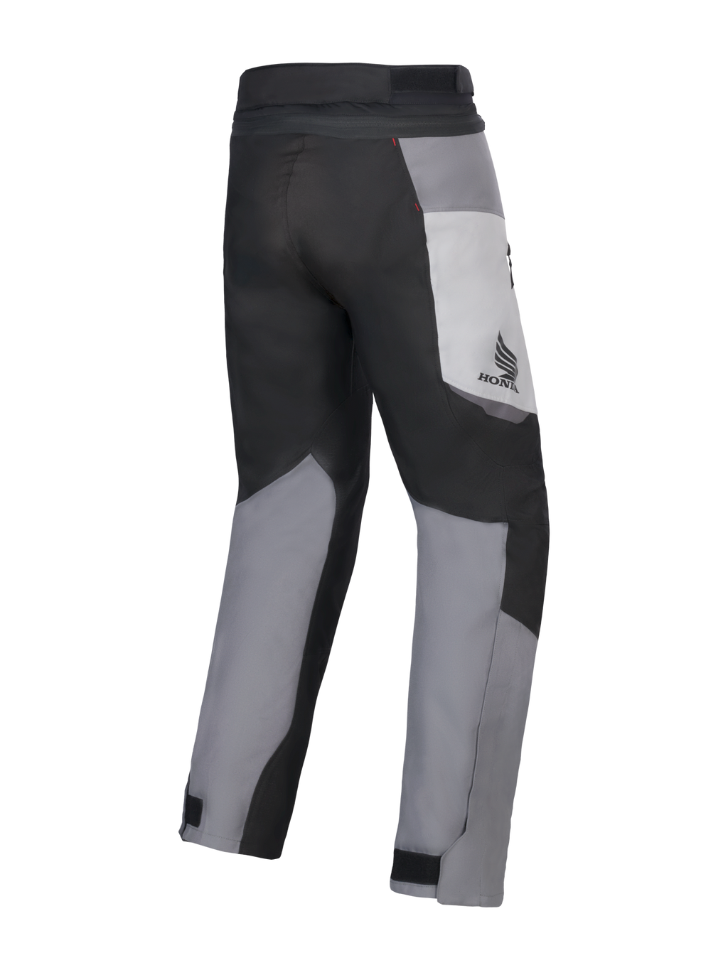 Spodnie Alpinestars Honda St-1 Waterproof, motocyklowe spodnie turystyczne, w kolorach Ice Gray, Dark Gray i czarnym, widok z tyłu ukazujący wielopanelową konstrukcję tekstylną, logo Honda na udzie i regulowane zapięcia na kostkach do jazdy w każdą pogodę.