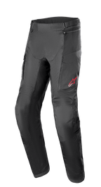 Alpinestars Andes Air Drystar® Pants, motocyklowe spodnie turystyczne, czarne, z obszernymi panelami z siatki dla wentylacji, czerwone logo gwiazdy na lewym udzie, regulowane paski w pasie i wzmocnione sekcje kolan, zaprojektowane dla komfortu turystycznego