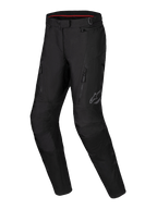 Alpinestars Stella ST-1 Waterproof Pants, damskie spodnie motocyklowe adventure touring, czarne, przednie kieszenie na zamek, wzmocnione panele na kolanach, odblaskowe logo Alpinestars na udzie, wodoodporna konstrukcja tekstylna z profilowanymi nogawkami