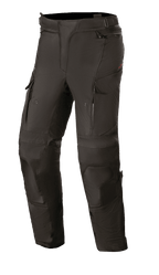 Alpinestars Stella Andes V3 Drystar, damskie spodnie motocyklowe turystyczne, czarne, wodoodporna i oddychająca konstrukcja tekstylna, wzmocnione panele na kolanach i udach, otwory wentylacyjne na udach zapinane na zamek, kieszenie cargo i regulowany pas do jazdy typu adventure.