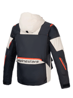 Alpinestars Kurtka Mogress Air, męska miejska kurtka motocyklowa, czarna i kremowa z pomarańczowymi akcentami, trwała tkanina ripstop, widok z tyłu z kapturem i dużym logo.