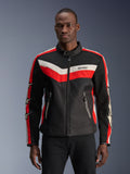Alpinestars T-Dyno Air Jacket, czarna z jasnoczerwonymi i kremowymi paskami w kształcie szewronu, z akcentami gwiazd na rękawach, wysoki kołnierz z zamkiem z przodu, kieszenie na zamek, tekstylna kurtka motocyklowa inspirowana stylem vintage